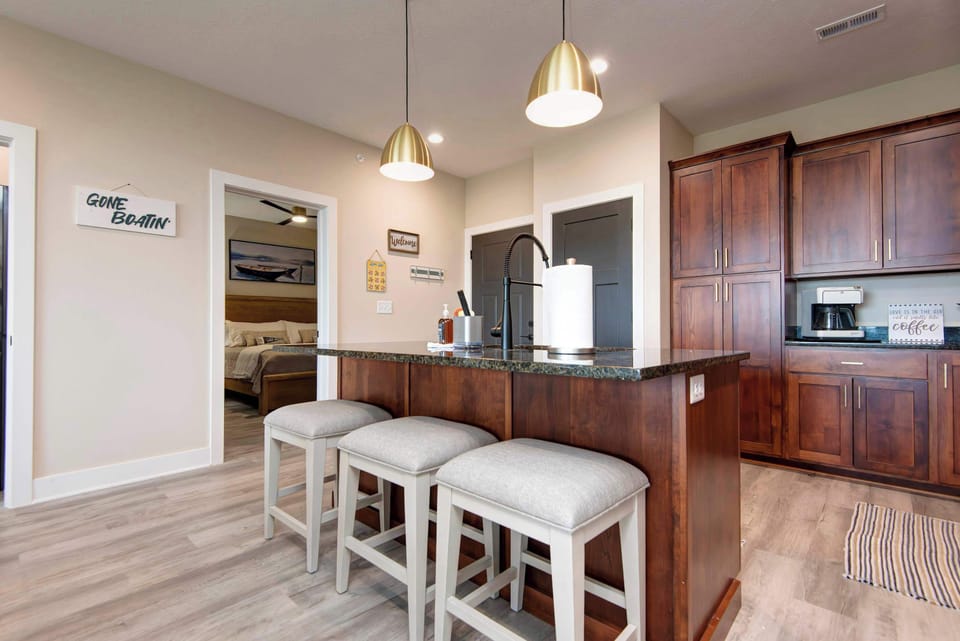 Breakfast bar with seating for three guests, perfect for casual dining, morning coffee, snacks, and gathering together during your vacation stay.