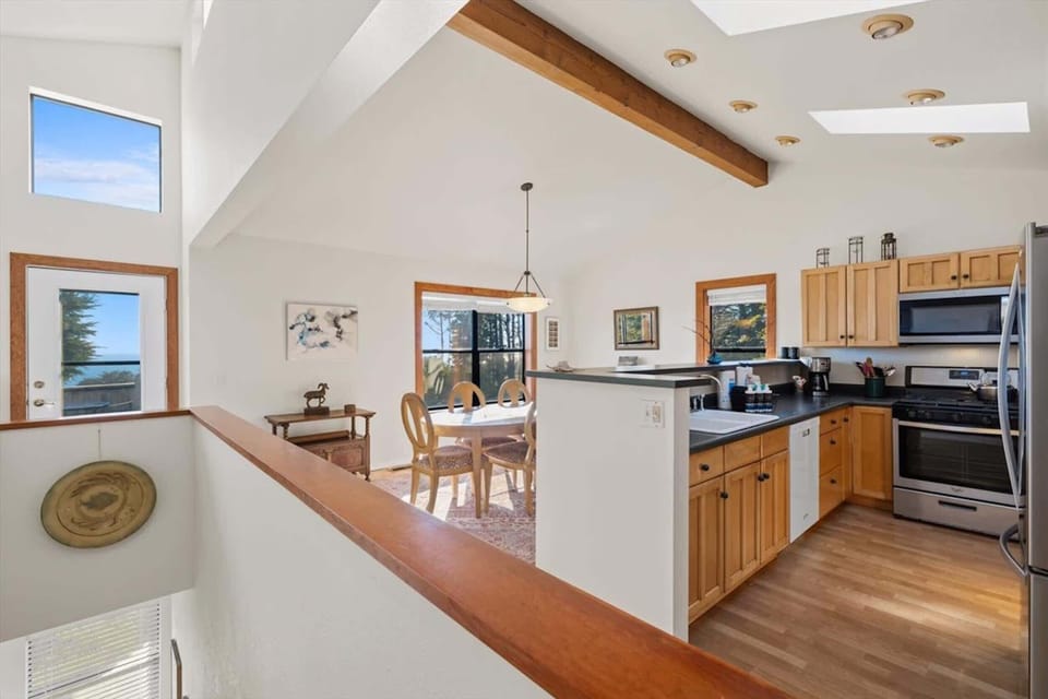Open concept w/ ocean views & patio access