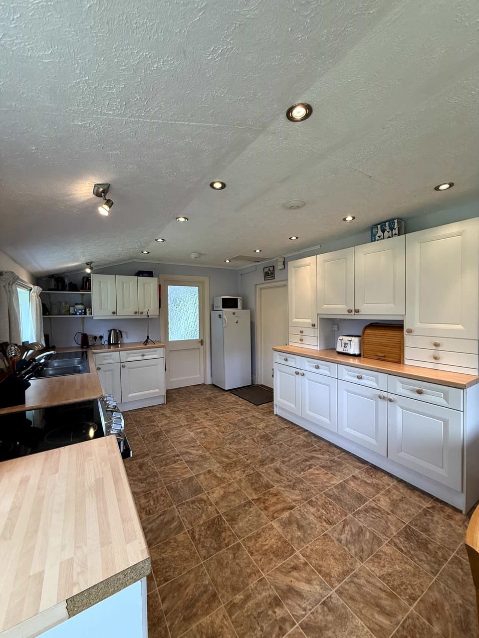 Kitchen with View to Utility Room