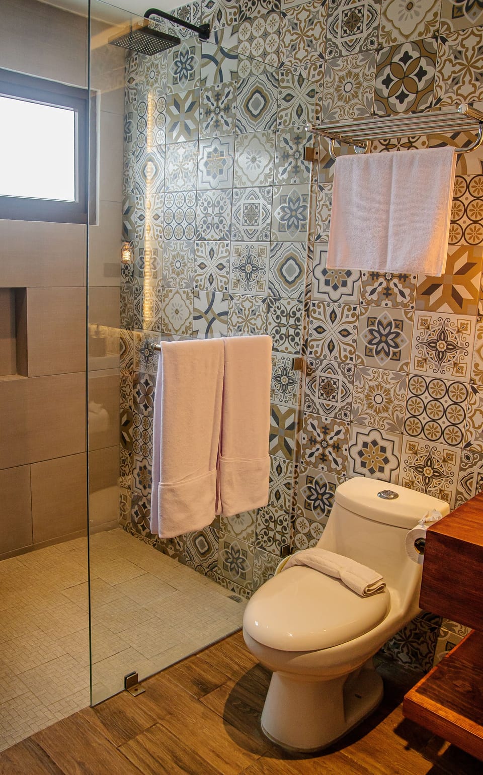 Shower, rainfall showerhead, designer toiletries, hair dryer