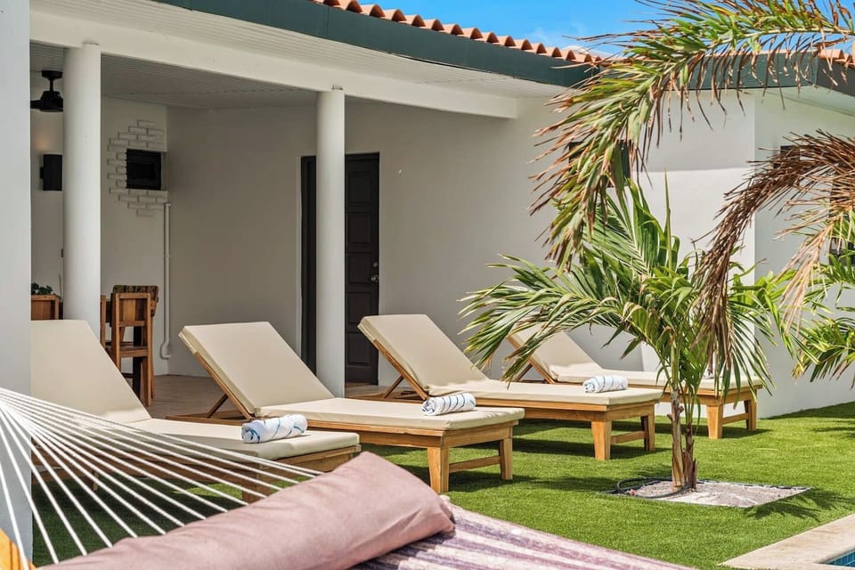 Cool off in the inviting pool, lounge under the Caribbean sun, and embrace your own private tropical retreat