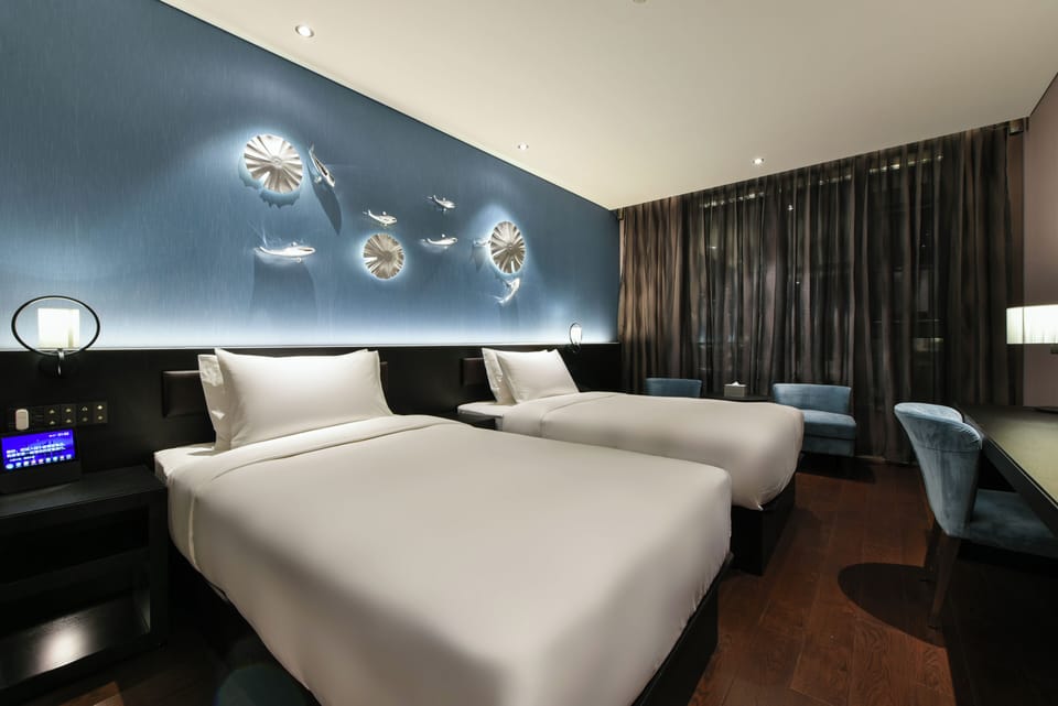 Basic Double Room | Down comforters, minibar (free items), desk, laptop workspace