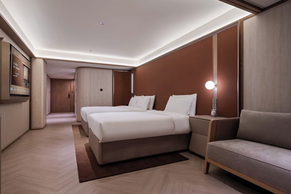 Family Triple Room | Down comforters, minibar (free items), desk, laptop workspace