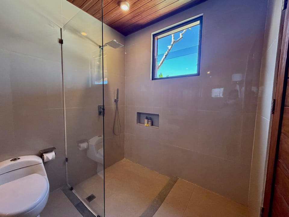 Deluxe Double Room, Patio | Bathroom | Shower, free toiletries, towels, soap