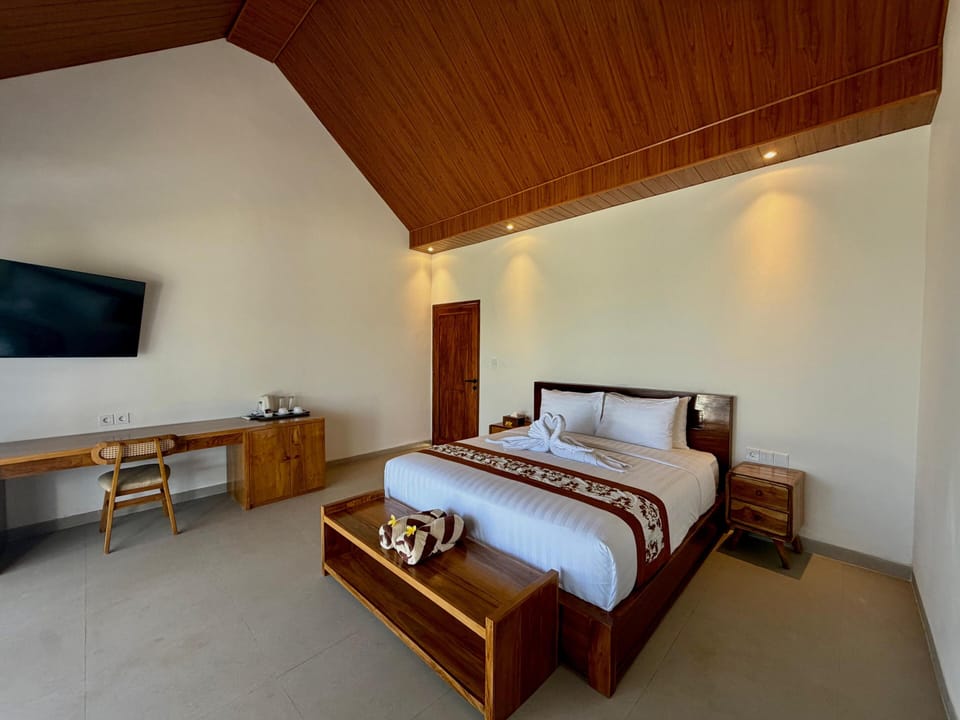 Deluxe Double Room, Patio | In-room safe, desk, laptop workspace, iron/ironing board (on request)