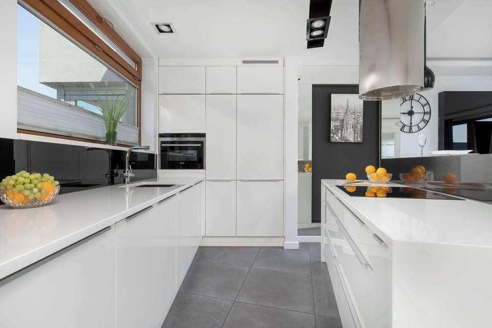 A modern kitchen with high quality appliances. Preparing meals is both easy and enjoyable.