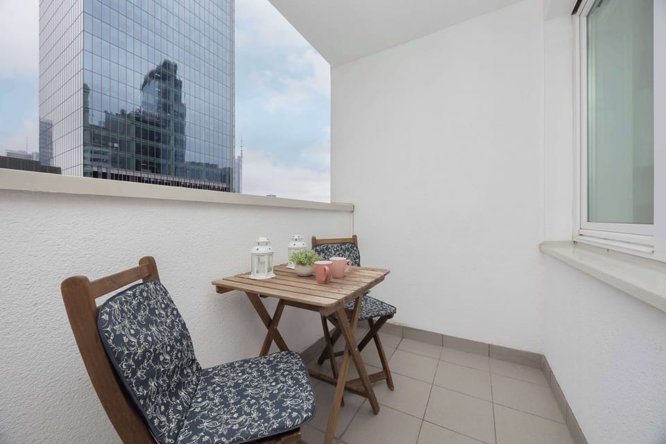 A private balcony with seating offers a pleasant place to enjoy fresh air. Relax outdoors with your morning coffee or an evening drink.