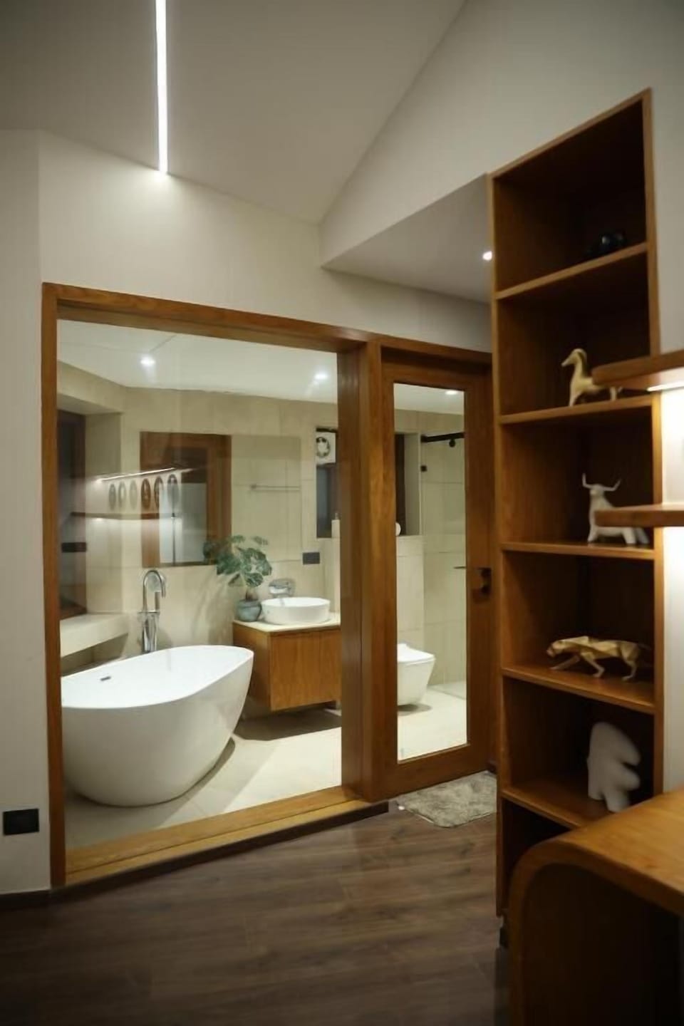Separate tub and shower, towels, soap, shampoo
