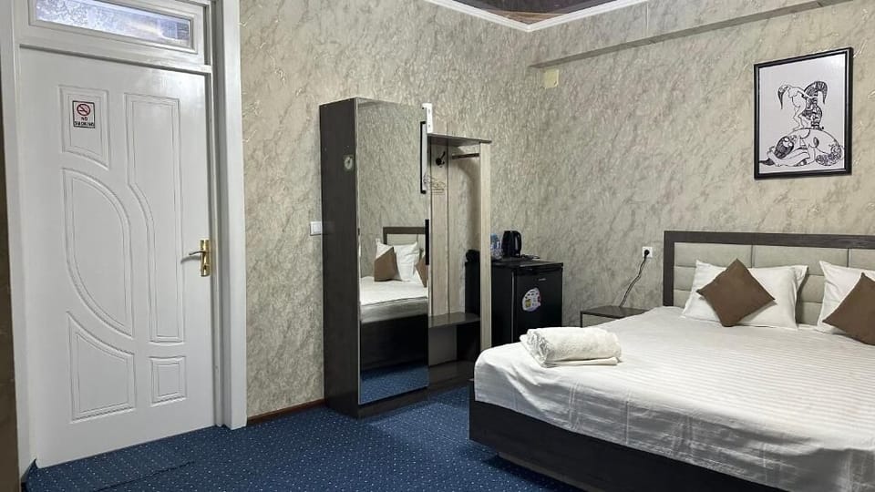Double Room, City View | In-room safe, desk, laptop workspace, soundproofing