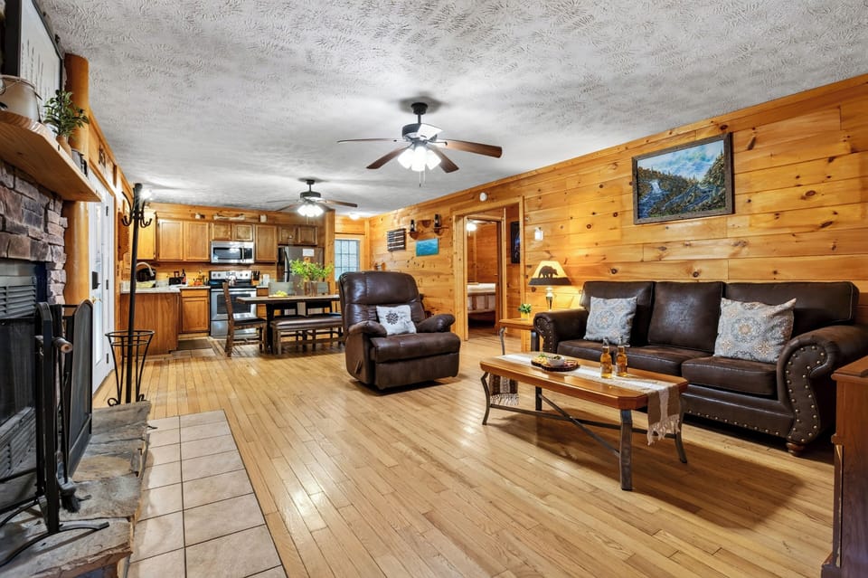 Spacious, light-filled open living layout showing the smooth transition between kitchen, dining, and seating areas.