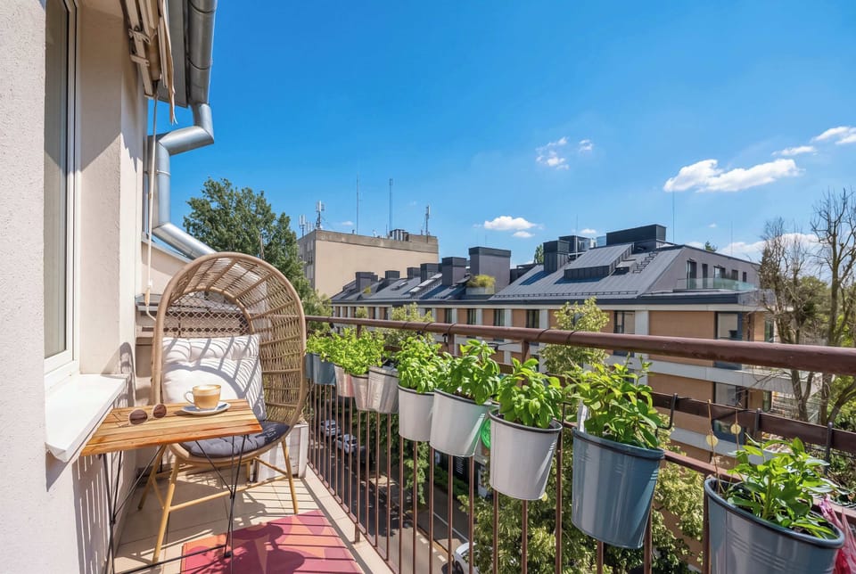 Private balcony with outdoor seating, perfect for enjoying your morning coffee or relaxing in the fresh air.