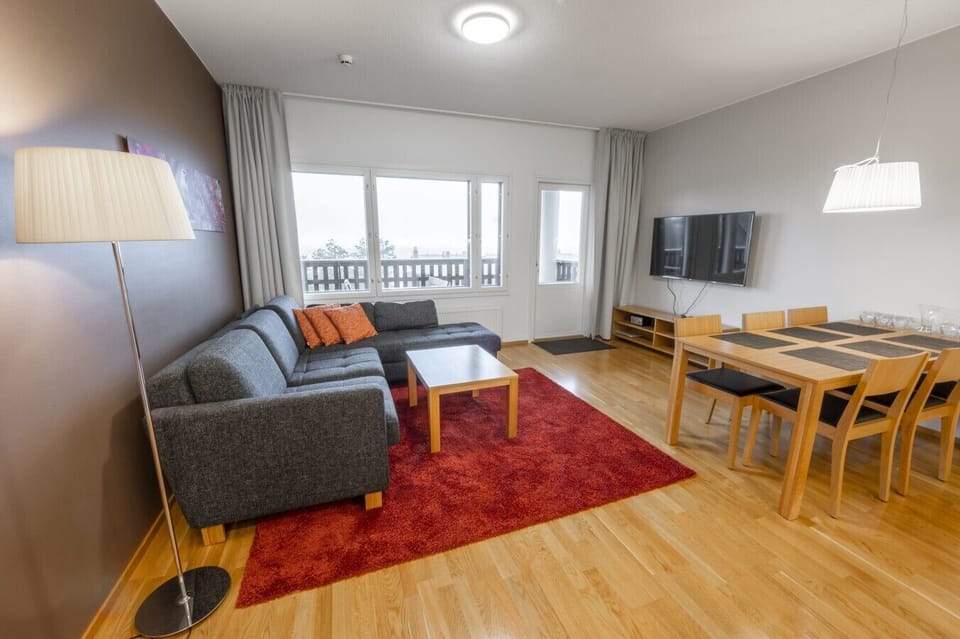 Living room with open kitchen chalet 1