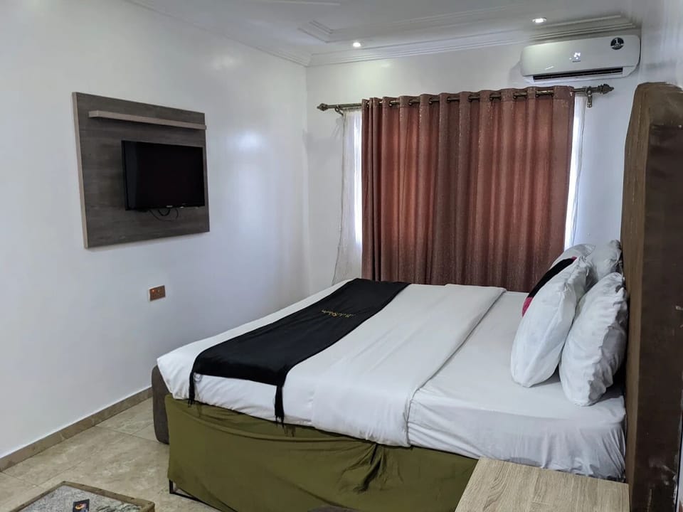 Family Room, Balcony, City View | Desk, laptop workspace, blackout drapes, soundproofing