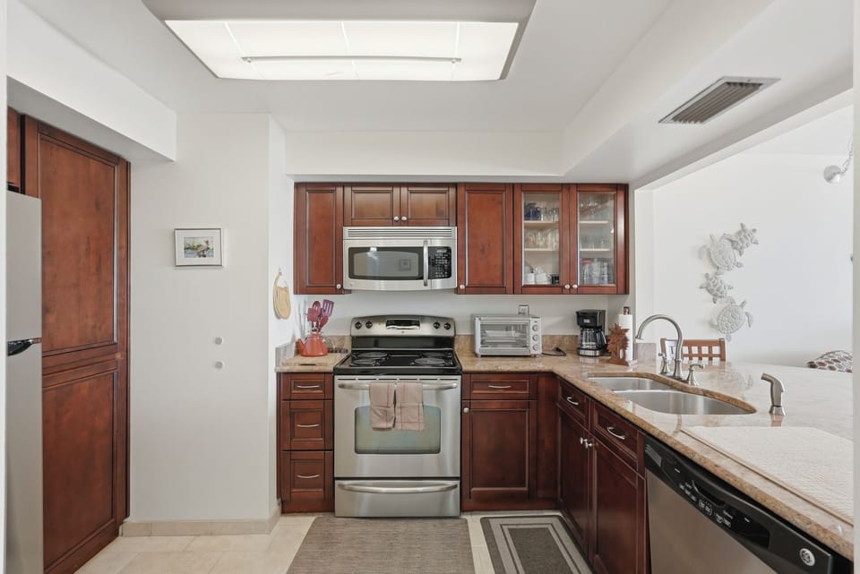 Fully equipped with modern appliances and thoughtful updates, the kitchen makes preparing meals simple and convenient, whether you're enjoying a quick breakfast or cooking a relaxing dinner.
