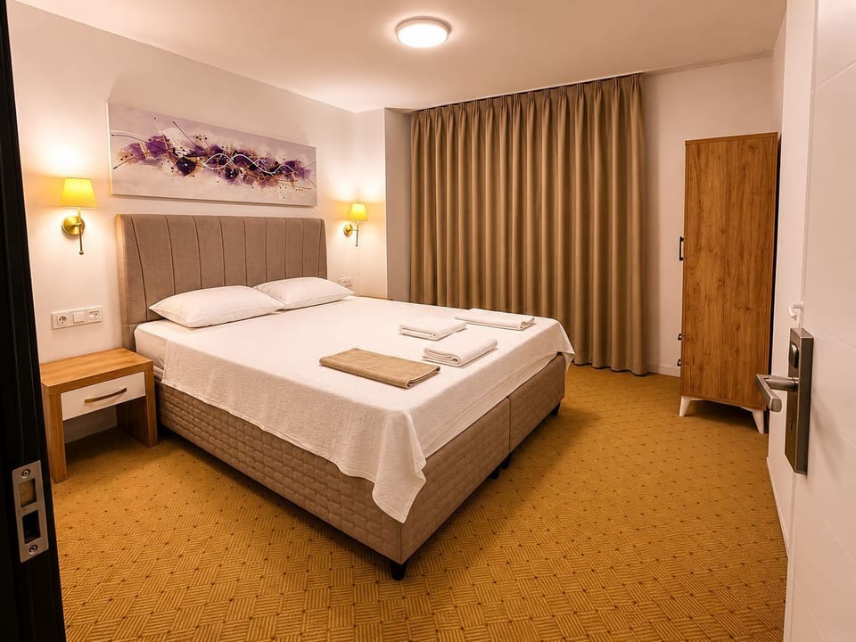 Family Suite, City View | In-room safe, desk, laptop workspace, soundproofing