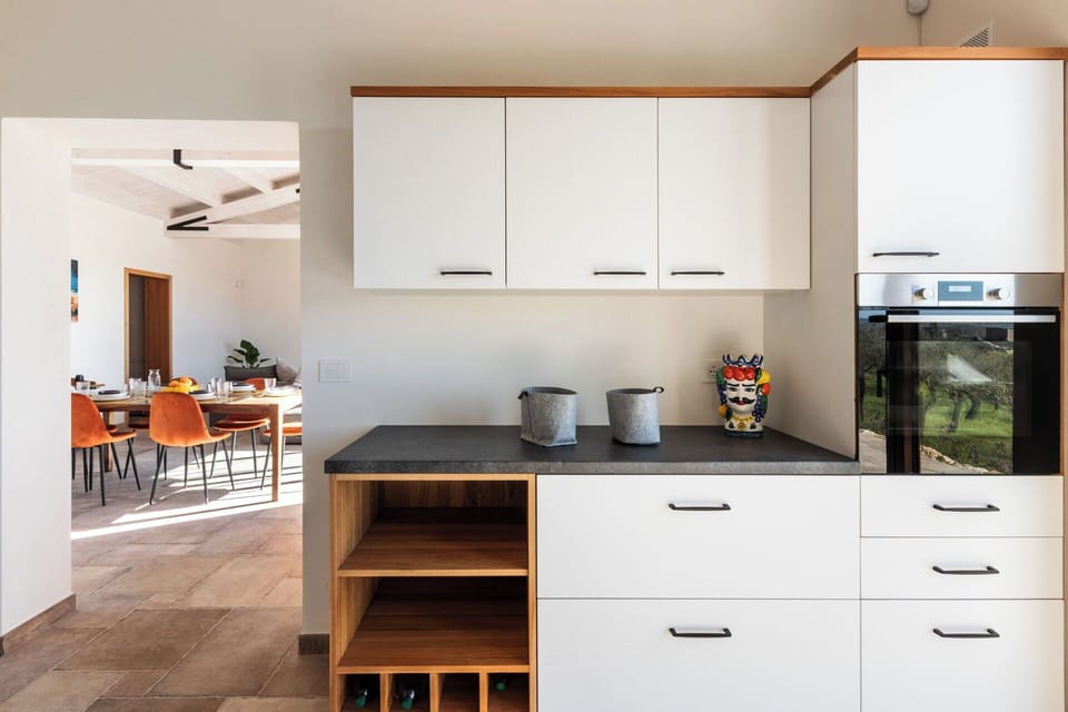 Furniture, Cabinetry, Countertop, Kitchen, Interior Design, Flooring, Kitchen Appliance, Wood, Drawer, Cupboard