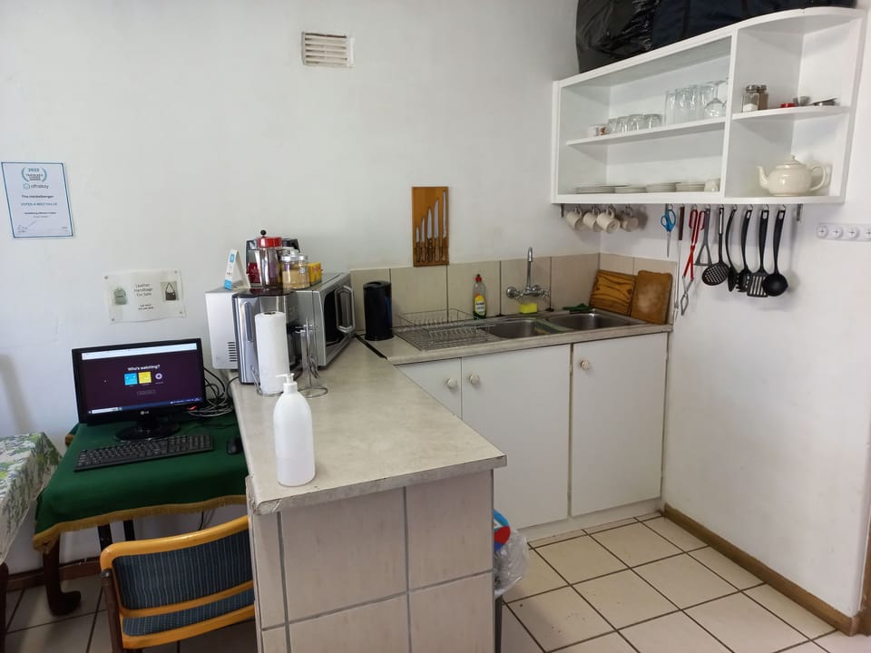 Standard Apartment, Patio, Canal View | Private kitchen