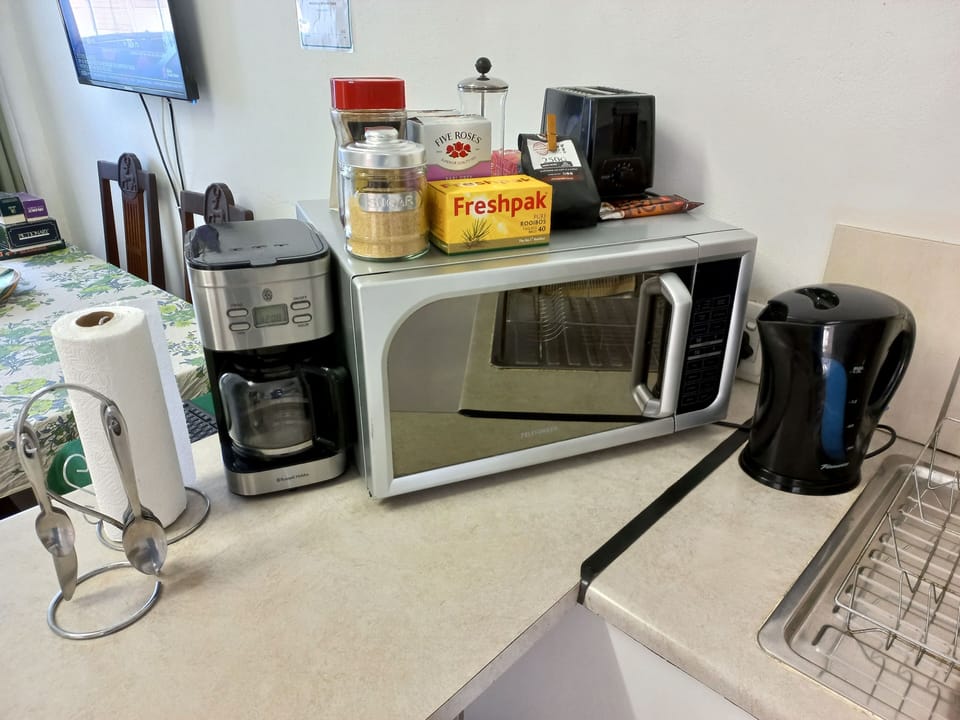 Standard Apartment, Patio, Canal View | Private kitchen