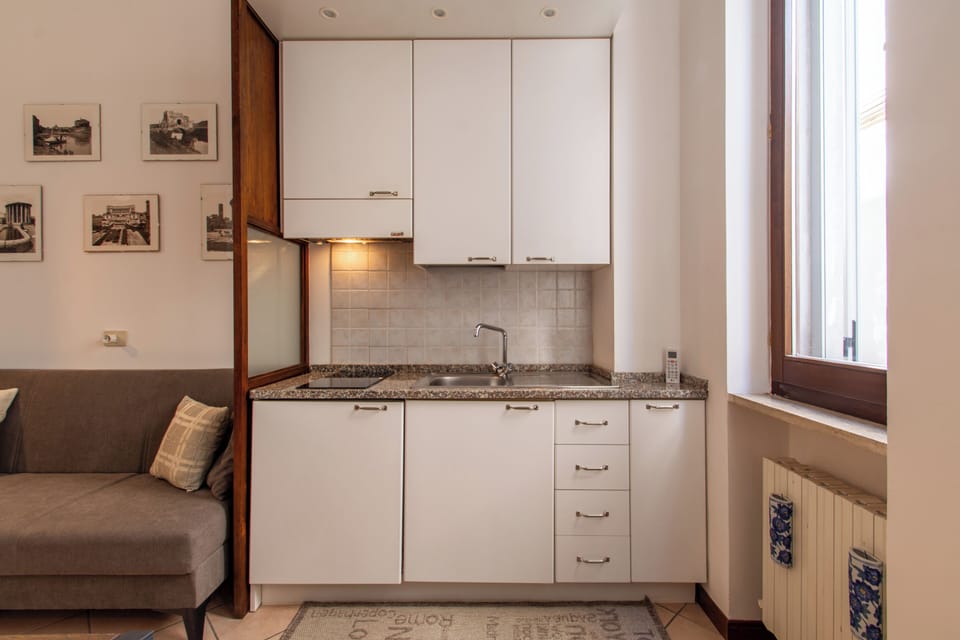 Apartment (1 Bedroom) | Living area | 32-inch Smart TV with cable channels