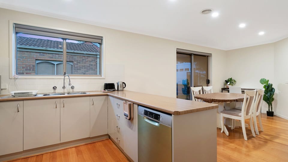 Enjoy meals together in the light-filled dining area.