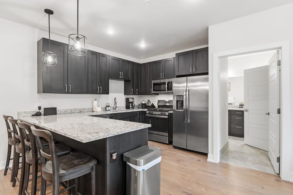 Gather around the oversized kitchen island with seating for four