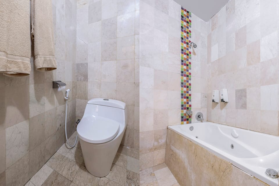 Deluxe Triple Room | Bathroom | Shower, rainfall showerhead, free toiletries, towels