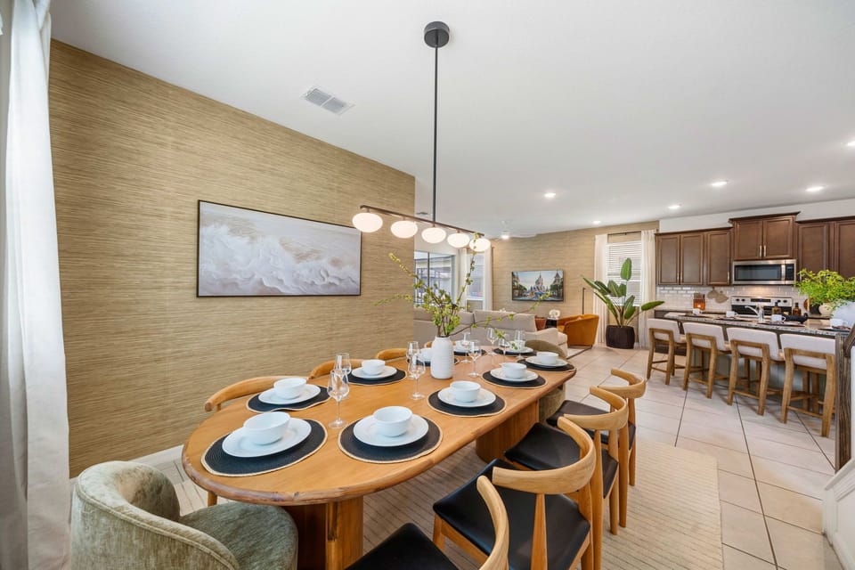 Spacious dining area with seating for family meals and gatherings.