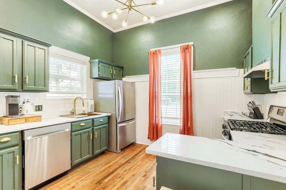 Modern conveniences meet historic charm in this well-equipped kitchen.