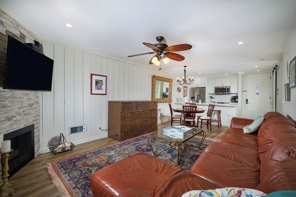 Condo, Multiple Beds, Garden View (G208 Treetop Hideaway) | Living area | Fireplace