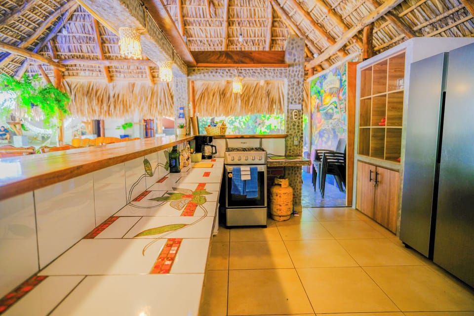 Full-size fridge, microwave, oven, cookware/dishes/utensils