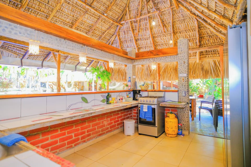 Full-size fridge, microwave, oven, cookware/dishes/utensils