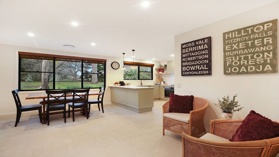 Mirambeena | Chef's kitchen with open plan casual dining area | Sitting nook | Dishwasher | Coffee pod machine | Electric stove top and oven | Ducted air conditioning | Highchair | Rural views | Wi-Fi 