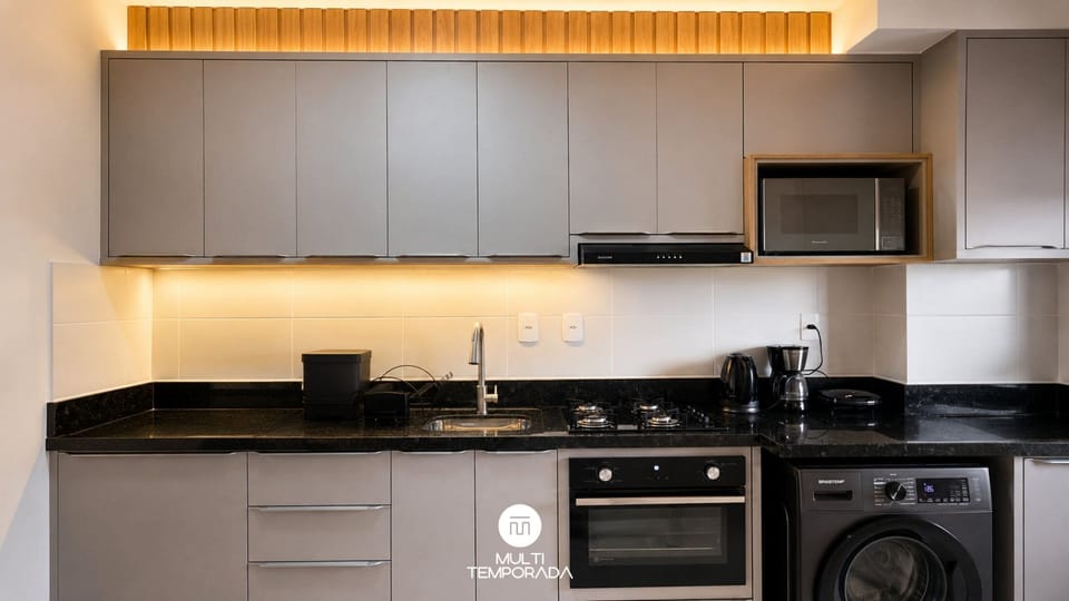 Premium Apartment, 2 Bedrooms, Pool Access | Private kitchen | Fridge, oven, cookware/dishes/utensils, kitchen island