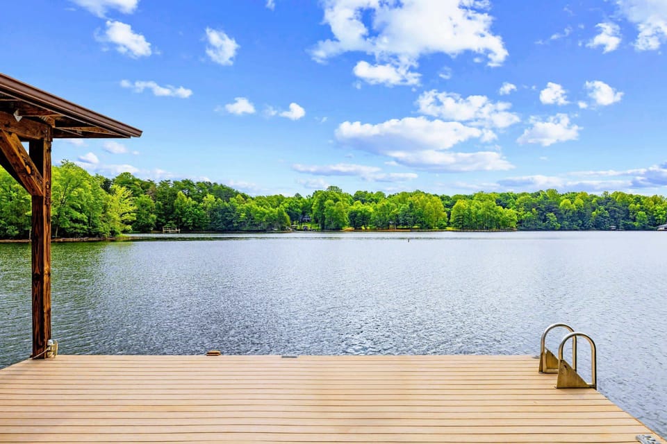 Dock & Boathouse - Wide, calm water off the end of the dock, with a swim ladder for quick dips.