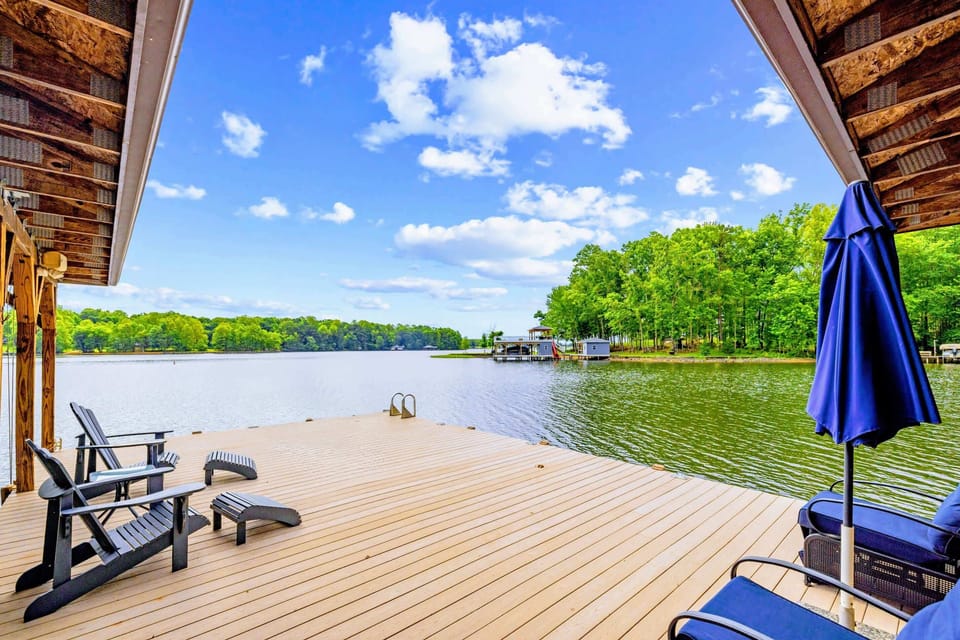 Dock & Boathouse - Step off the dock straight into the wide, swimmable cove.