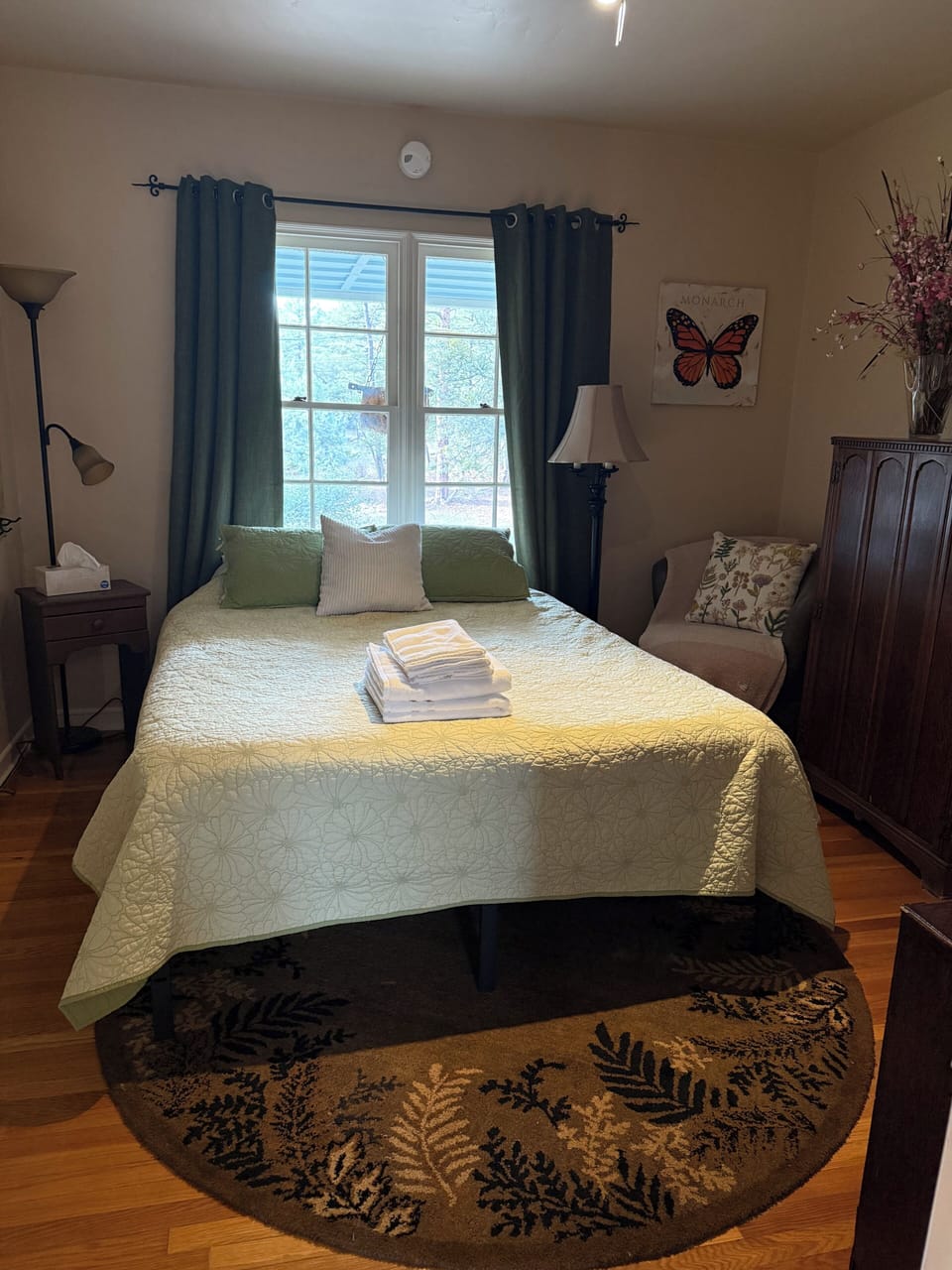 Room three: Queen bed in a cozy space.
