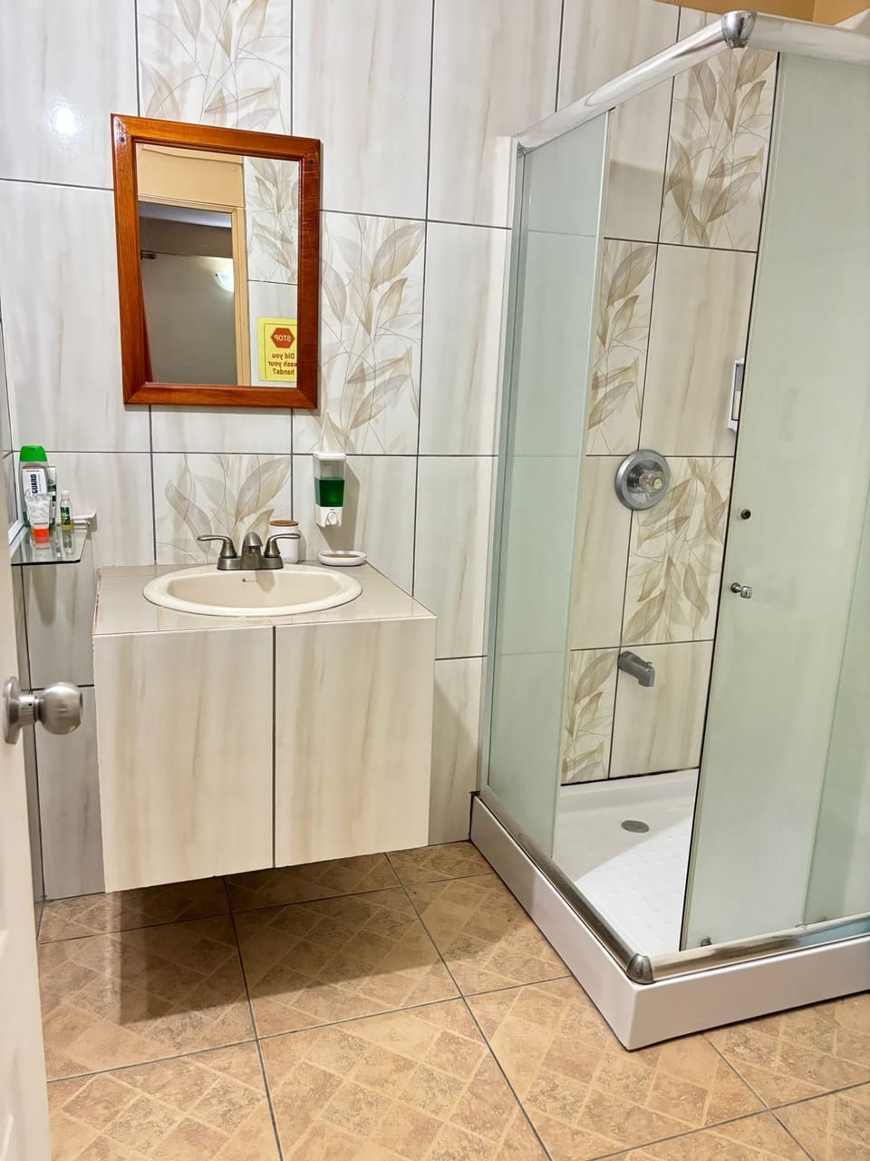 Shower, rainfall showerhead, hair dryer, towels