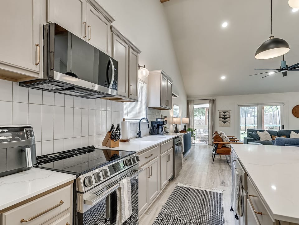 Full kitchen Appliances including: Pots/Pans, Cooking Utensils, Knife Set, Large Farm Sink, Coffee Maker, Microwave, Oven/Stove combo, etc. 