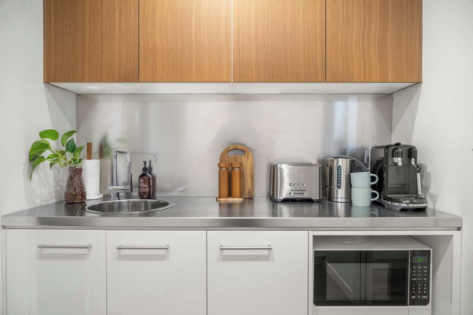Butler's pantry offers additional storage and preparation space during your stay