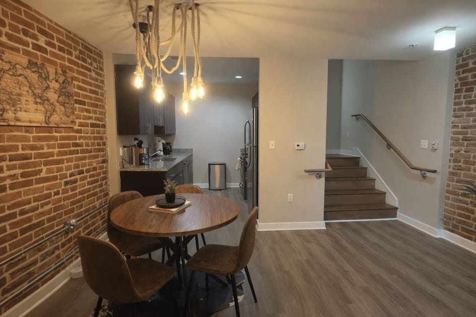 Dining area and apartment entry with an open, easy-flow layout