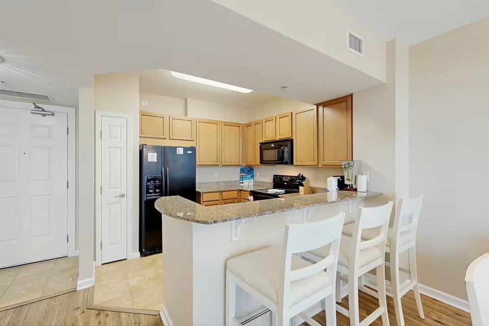 Pull up a seat at the breakfast bar for coffee, quick bites, or sunset cocktails