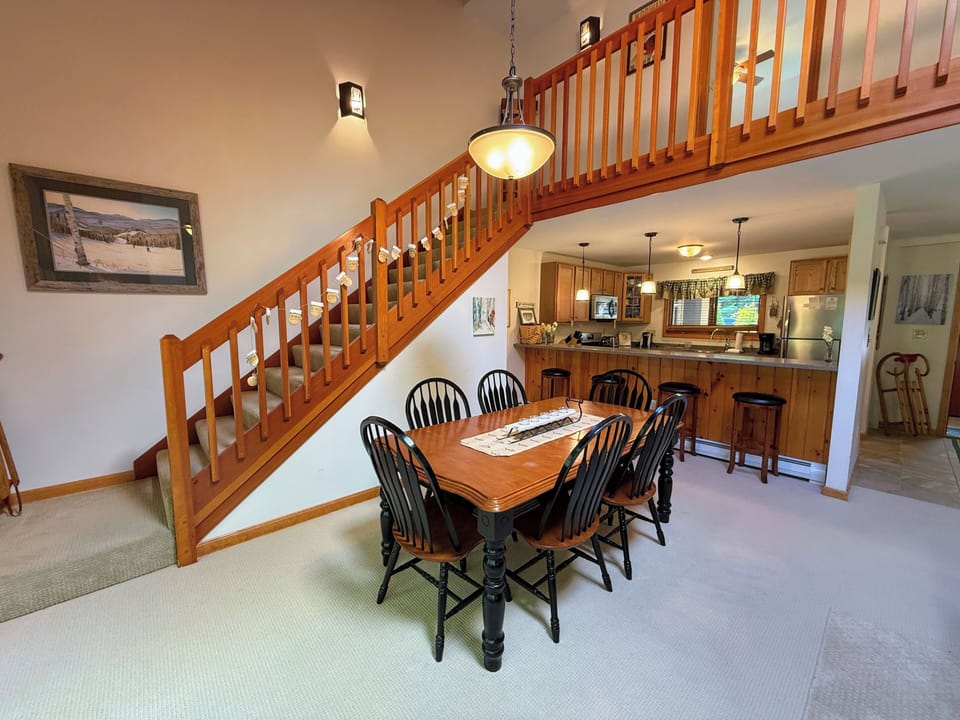 Dining area adjacent to stairs