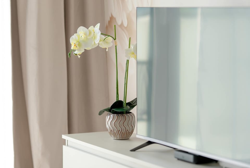 Refined interior detail with flowers and decorative accessories.