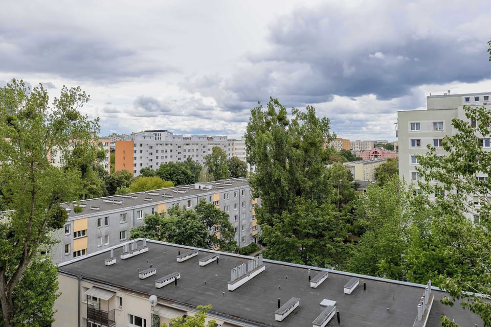 Pleasant view overlooking green trees and the surrounding residential neighborhood.