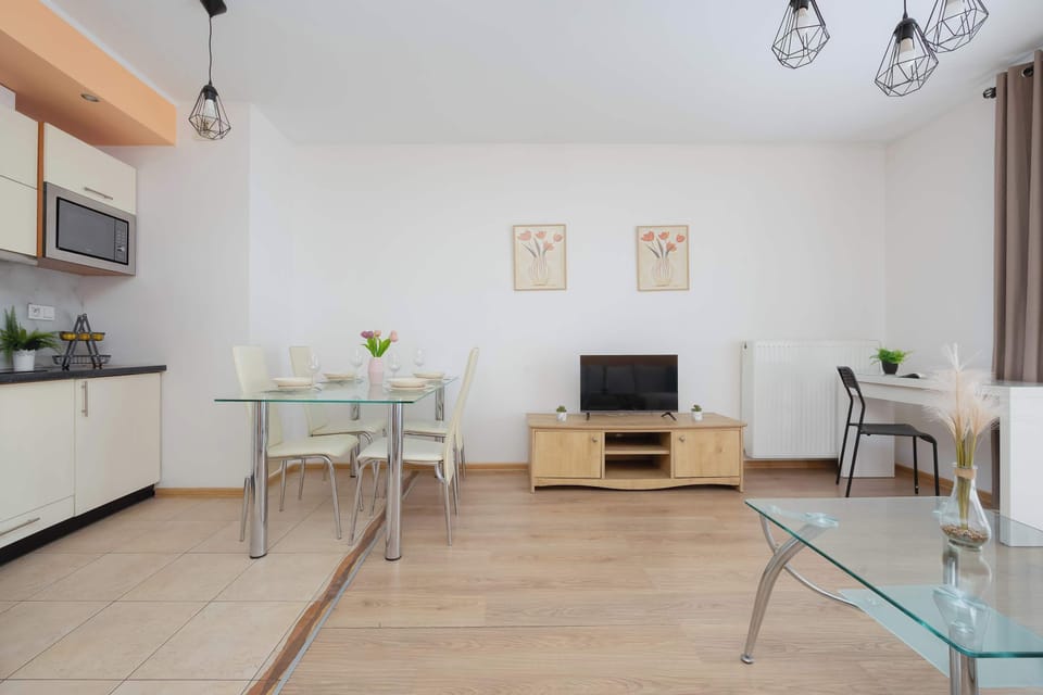 Open-plan living room with a seating area and dining space.