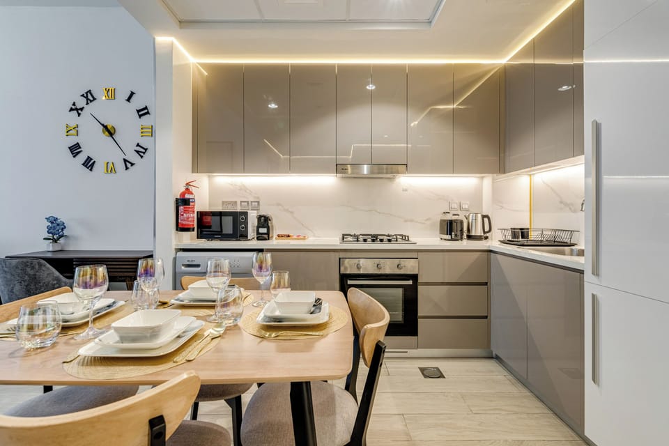 Deluxe Apartment, 1 Bedroom, Balcony, Pool View | Private kitchen | Coffee/tea maker, full-size fridge, microwave, oven