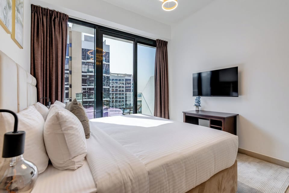 Deluxe Apartment, 1 Bedroom, Balcony, Pool View | Desk, laptop workspace, iron/ironing board, WiFi (free)