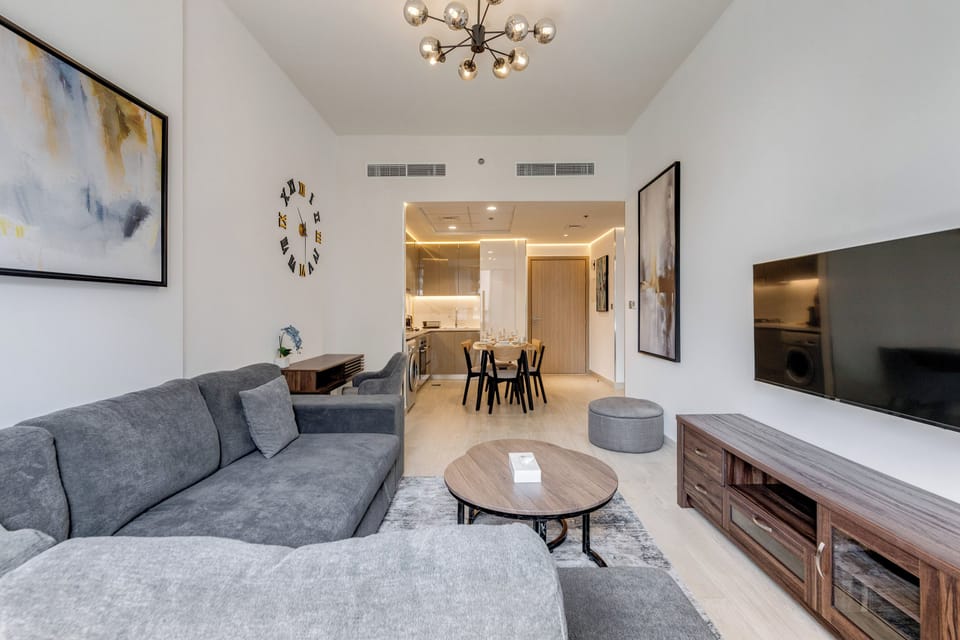 Deluxe Apartment, 1 Bedroom, Balcony, Pool View | Living area | 43-inch flat-screen TV with digital channels, Netflix