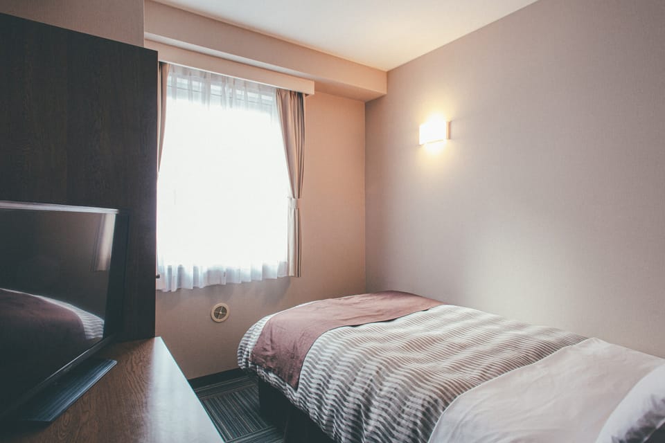 Down comforters, desk, free WiFi, bed sheets