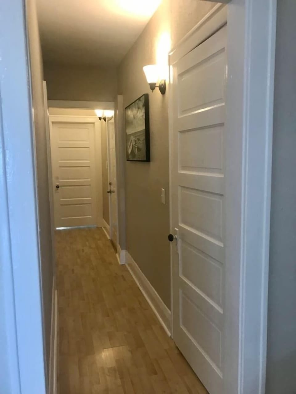 Bedrooms and bath on the other end of hallway.